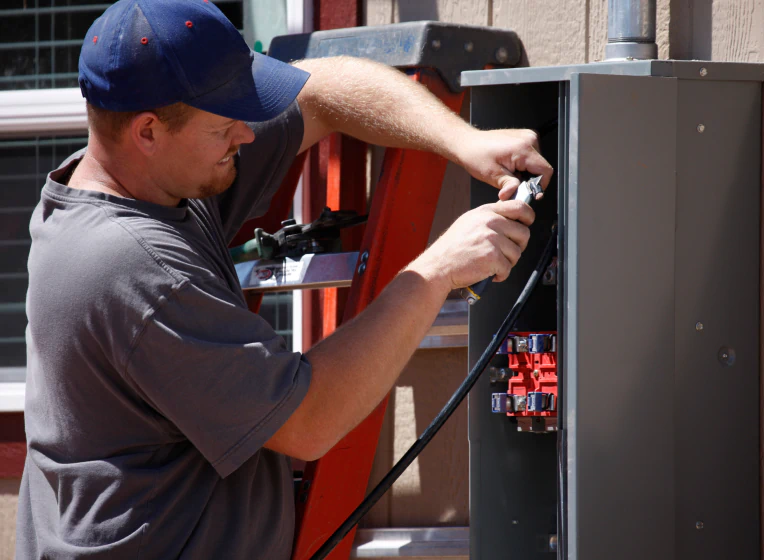 electrician doing an electrical panel upgrade